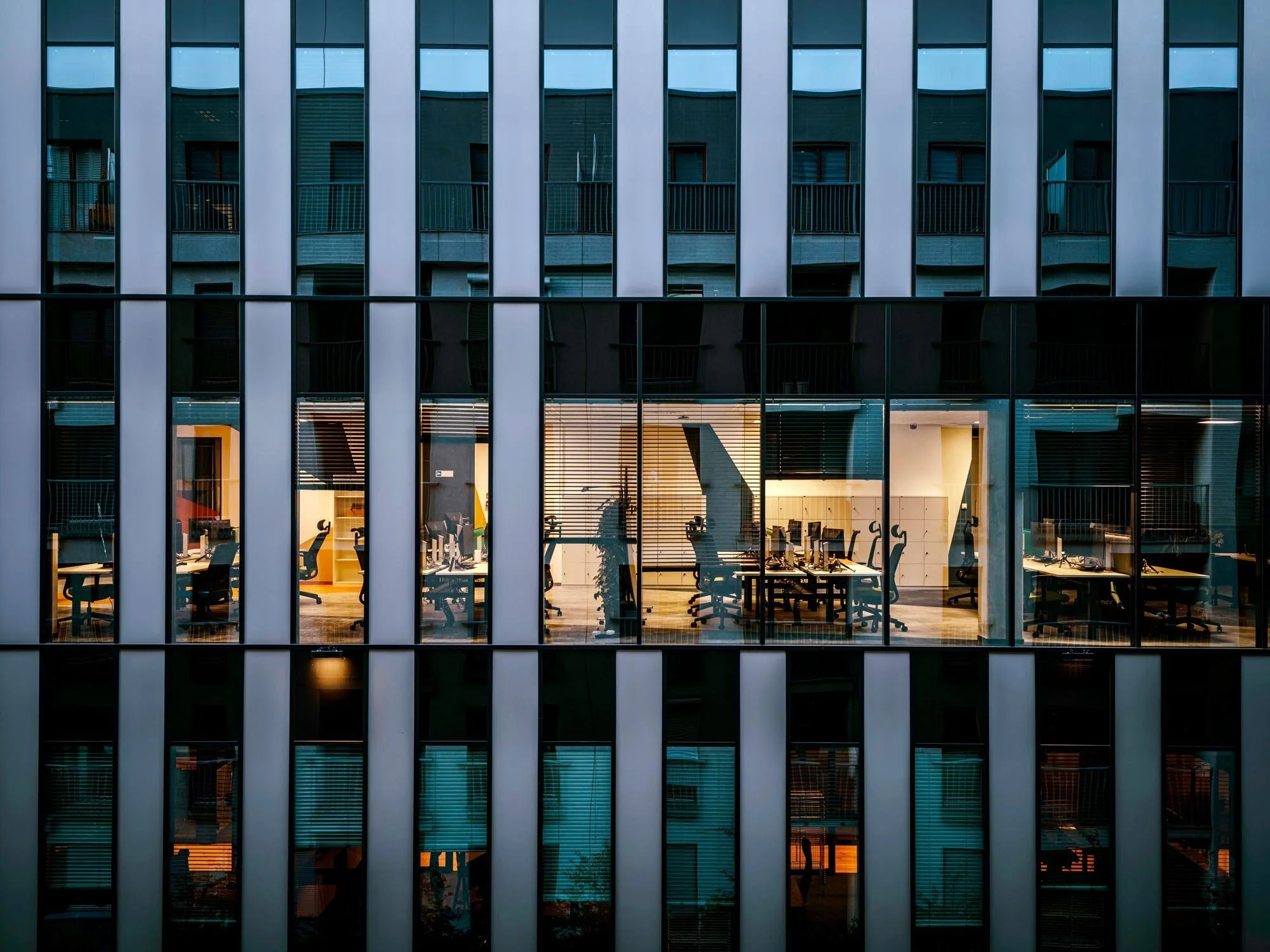 Office building facade at dusk